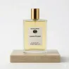 Eau de parfum Bergamote, Fleur d'Oranger, Pêche, Jasmin, Iris, Héliotrope, Musc blanc, Fève Tonka, Cèdre.